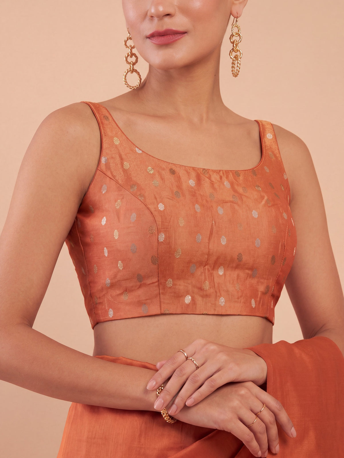 Orange zari woven georgette sleeveless readymade saree blouse with round neck view 2