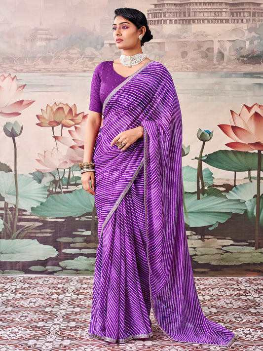 Woman wearing purple georgette saree with striped pattern design and purple blouse