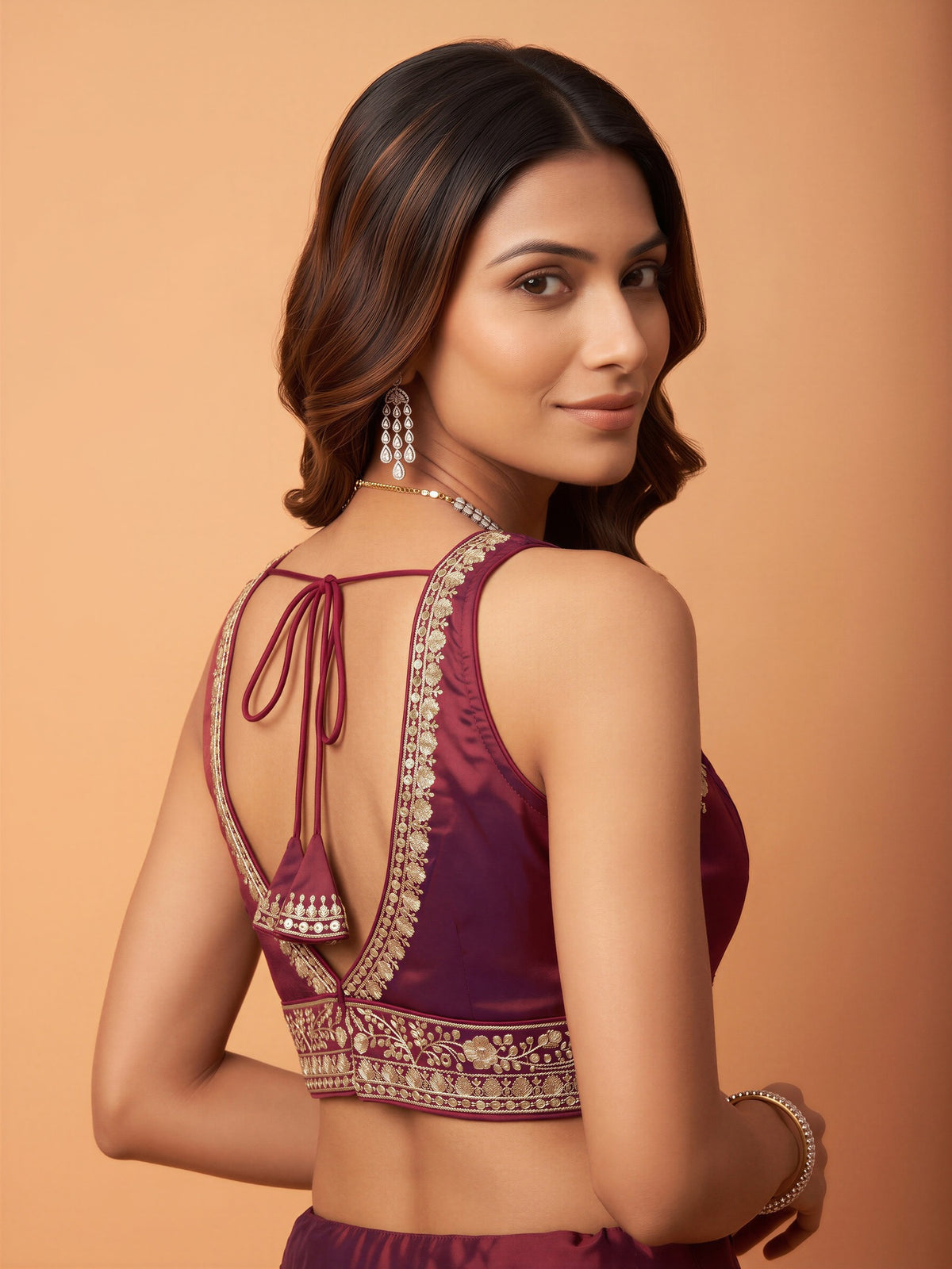 Maroon sequin embellished silk blend sleeveless readymade saree blouse with deep v neck view 1