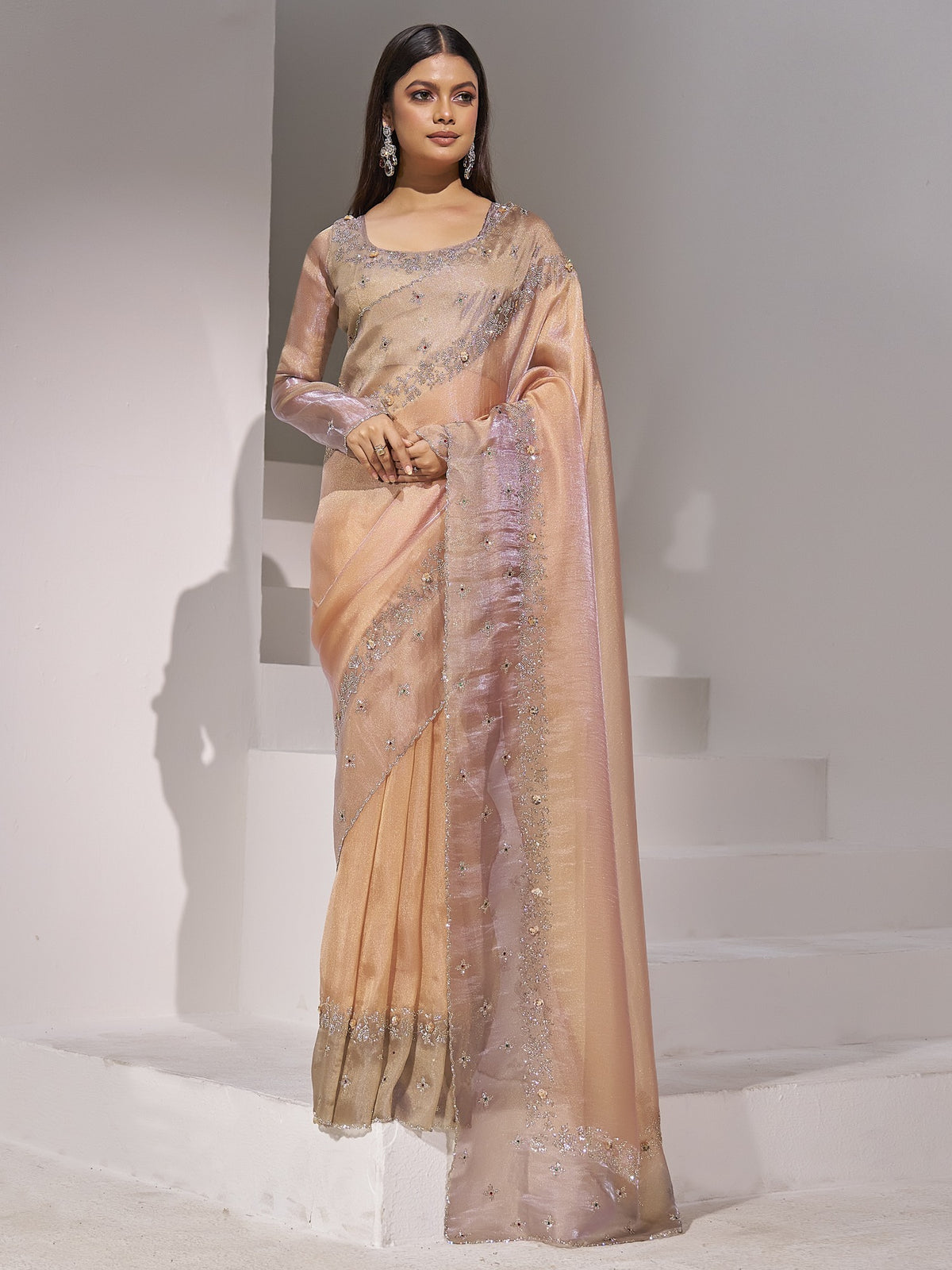 Peach applique organza saree with silver blouse piece