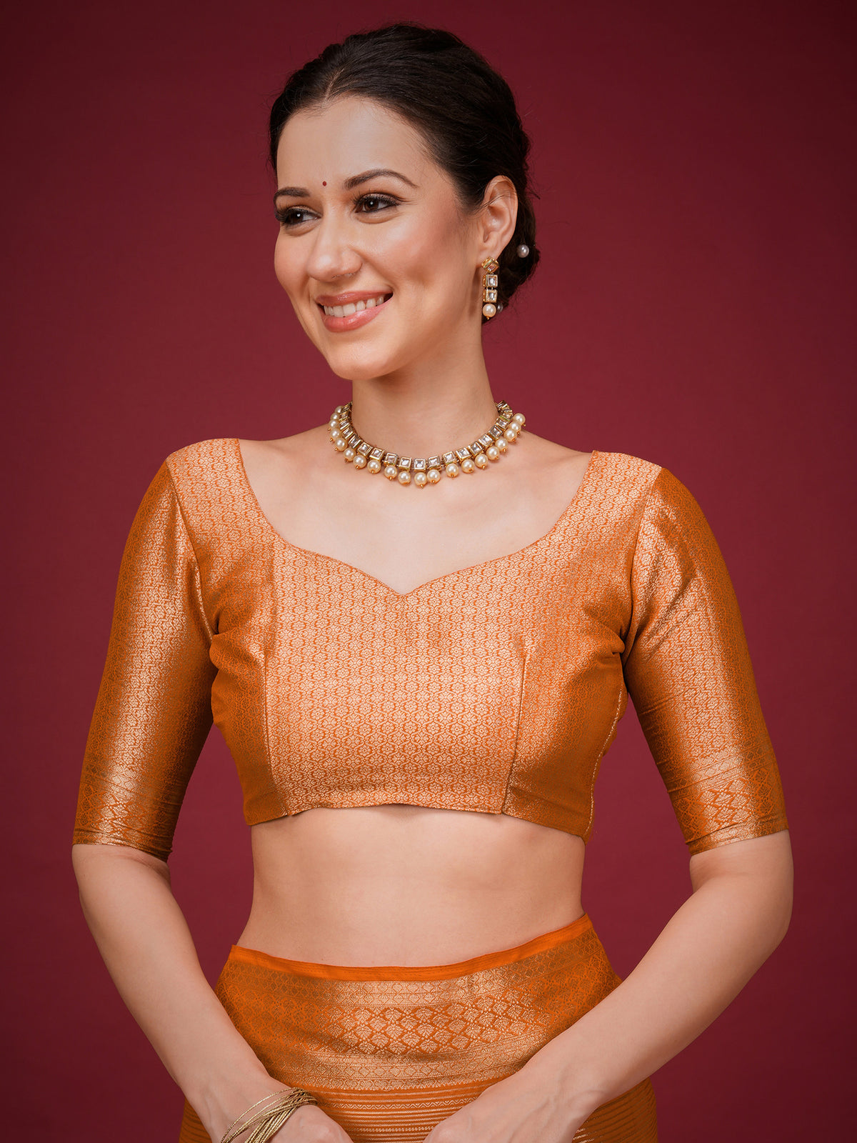 Unstitched orange viscose silk blouse piece with woven design design