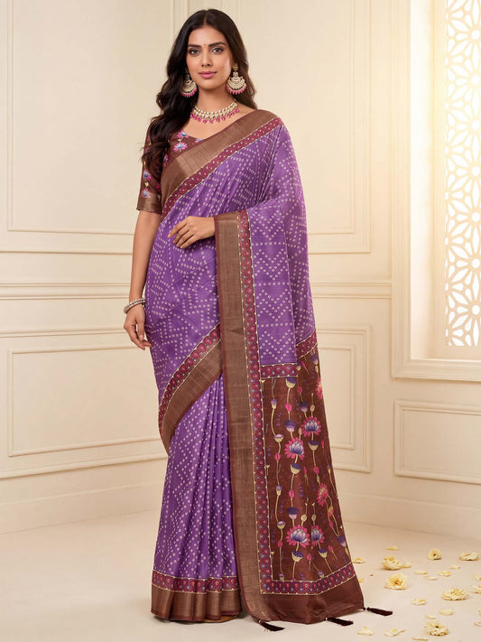 Woman wearing lavender silk blend saree with bandhani tie-dye dot work and brown blouse