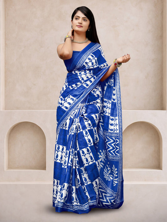 Woman wearing blue cotton saree with dabu mud-resist print work and blue blouse