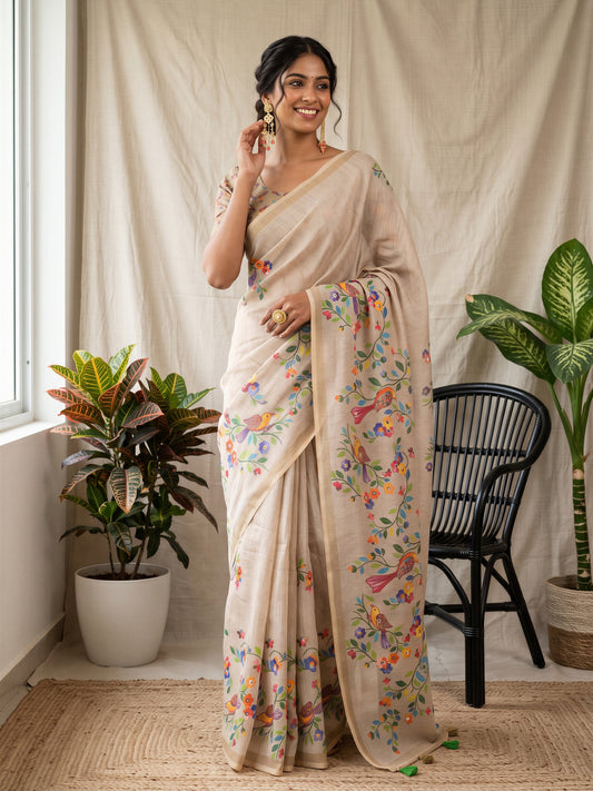 Woman wearing taupe linen blend saree with botanical floral and leaf design and taupe blouse