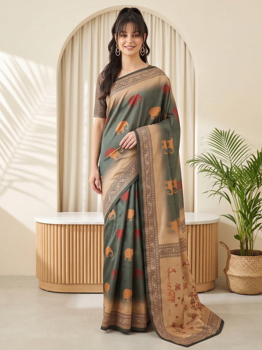 Woman wearing grey silk blend saree with peacock motif design and grey blouse