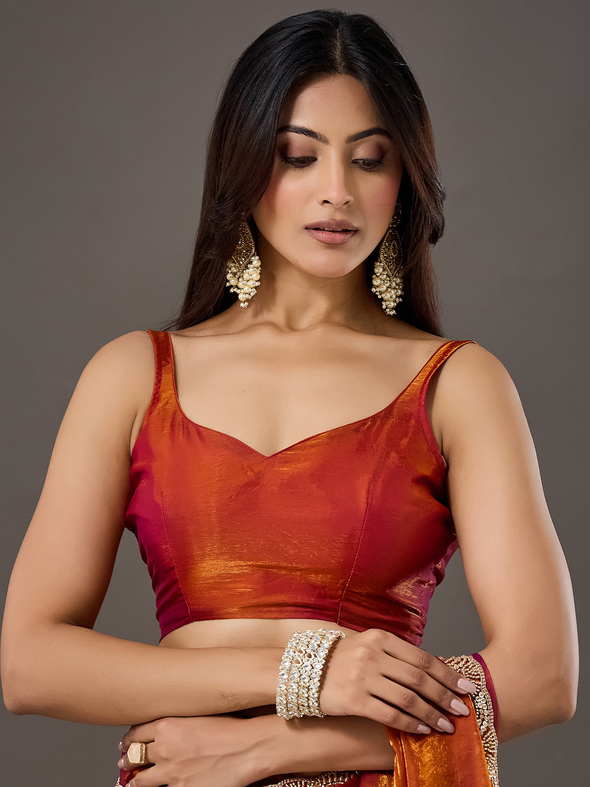 Unstitched orange satin blouse piece with solid design