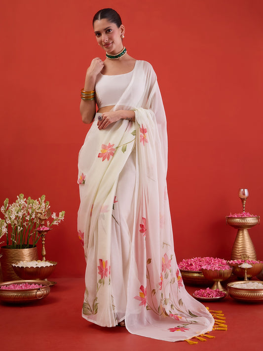 Woman wearing off white chiffon ready to wear saree with hand-painted motif work and off white blouse