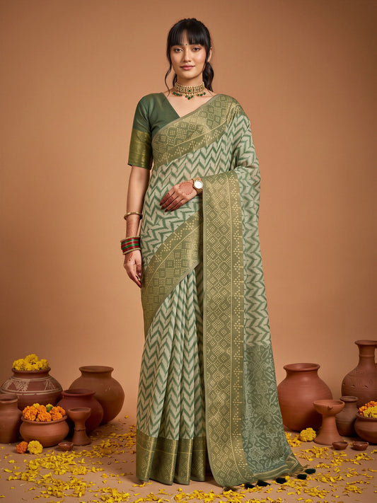 Woman wearing green viscose saree with geometric pattern design and green blouse