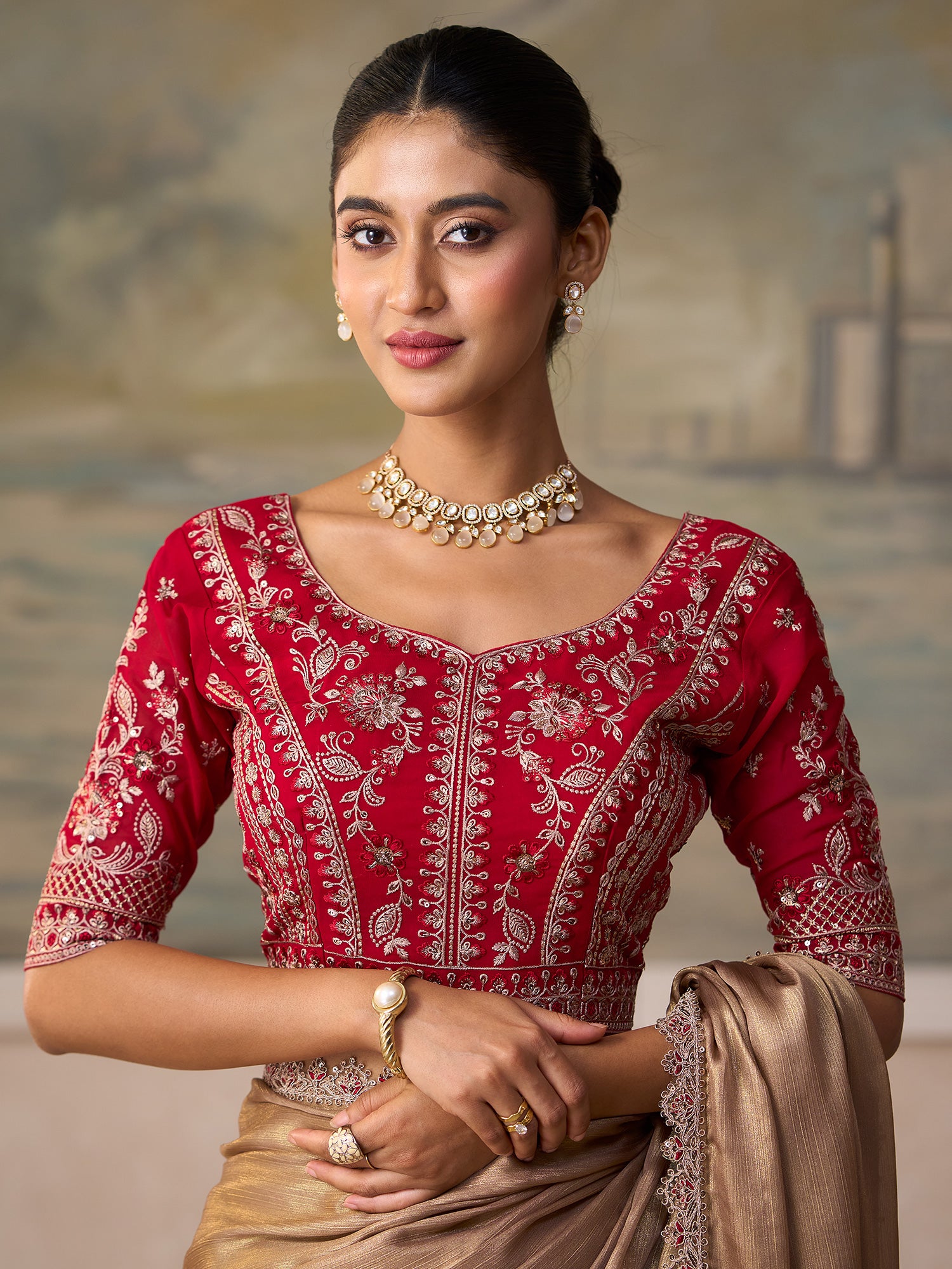 Unstitched red georgette blouse piece with embellished design