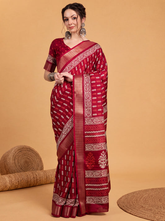 Woman wearing red silk blend saree with traditional indian motif work and red blouse