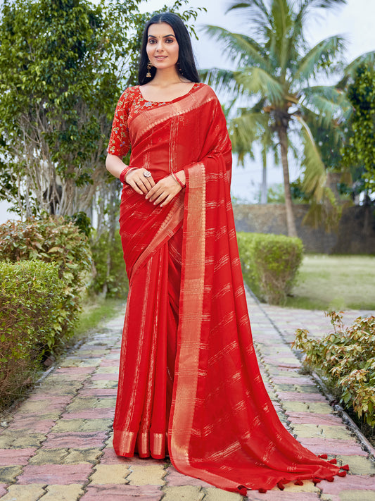 Woman wearing red georgette saree with striped pattern design and red blouse