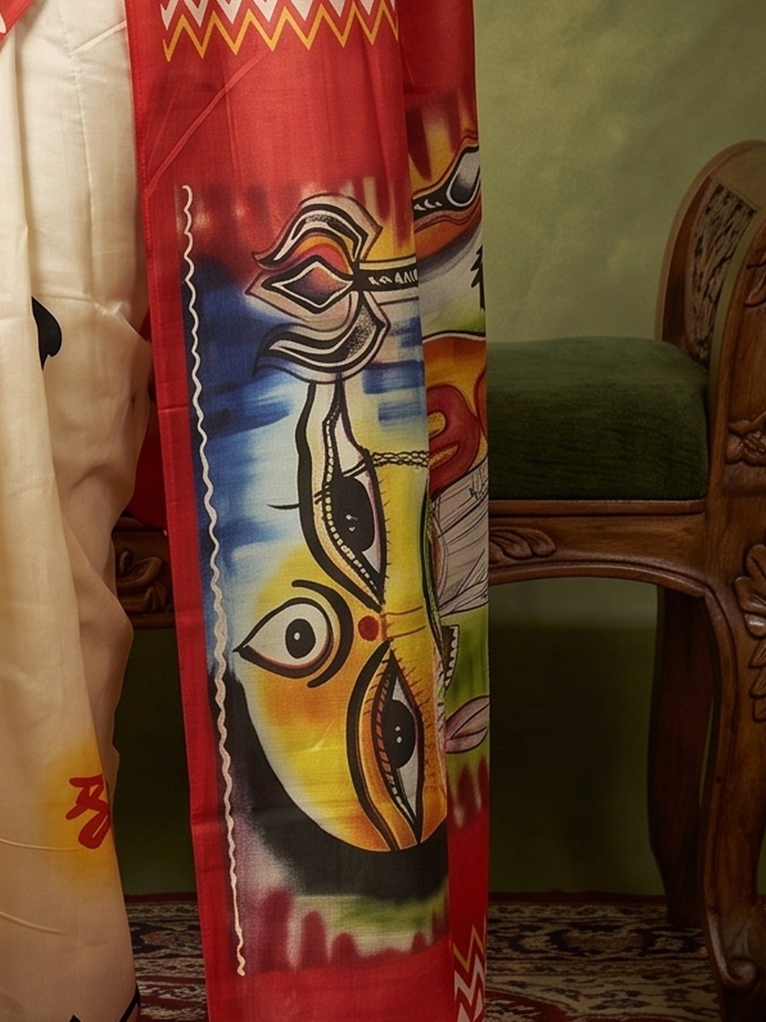 Pallu detail of off white silk blend saree showing traditional indian motif work and solid border