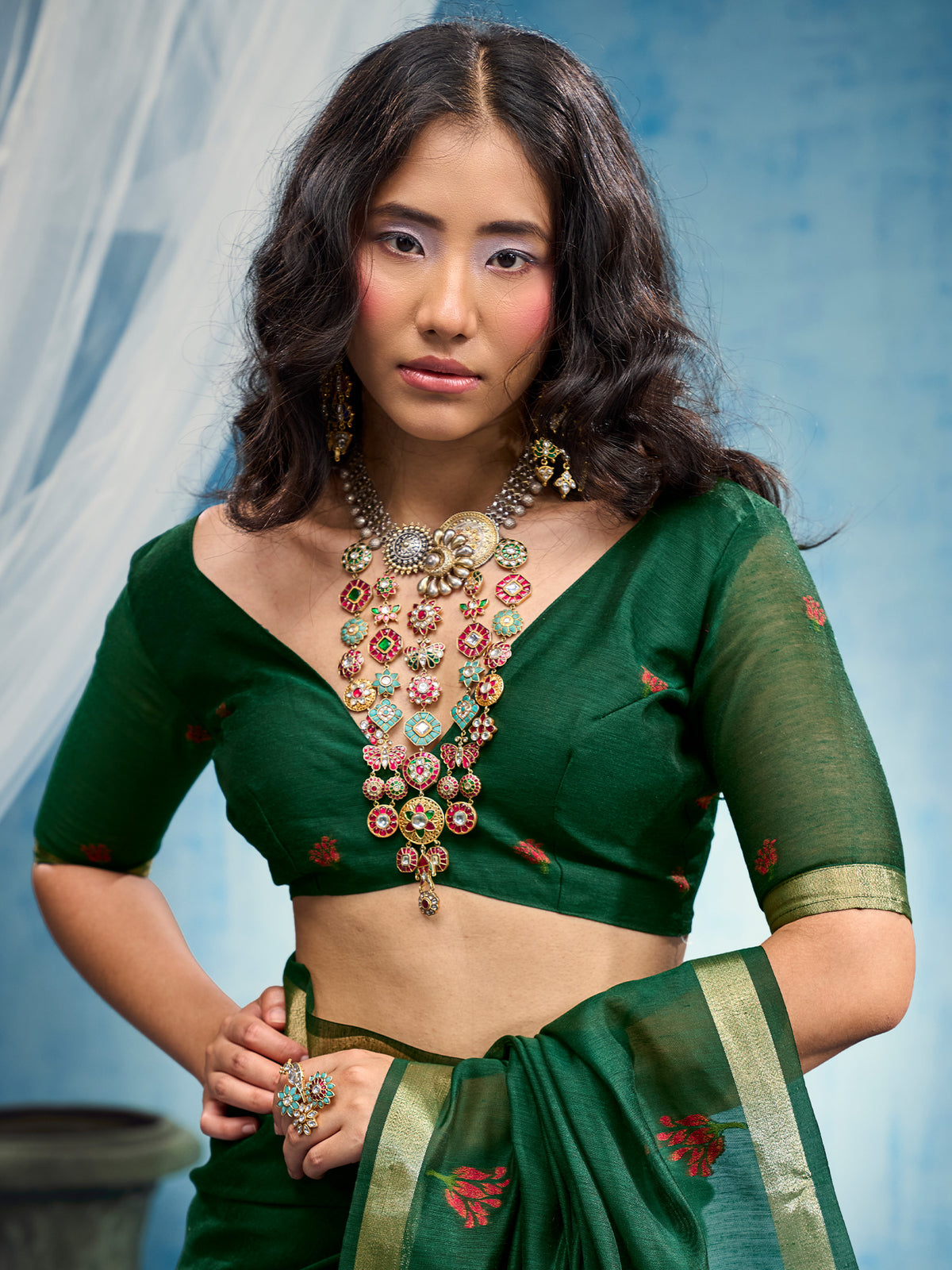 Unstitched green muga cotton blouse piece with woven design design