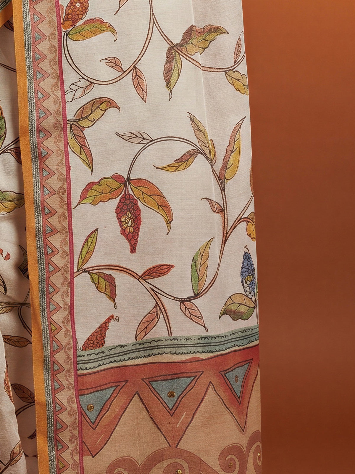 Pallu detail of off white linen blend saree showing botanical floral and leaf design and printed border