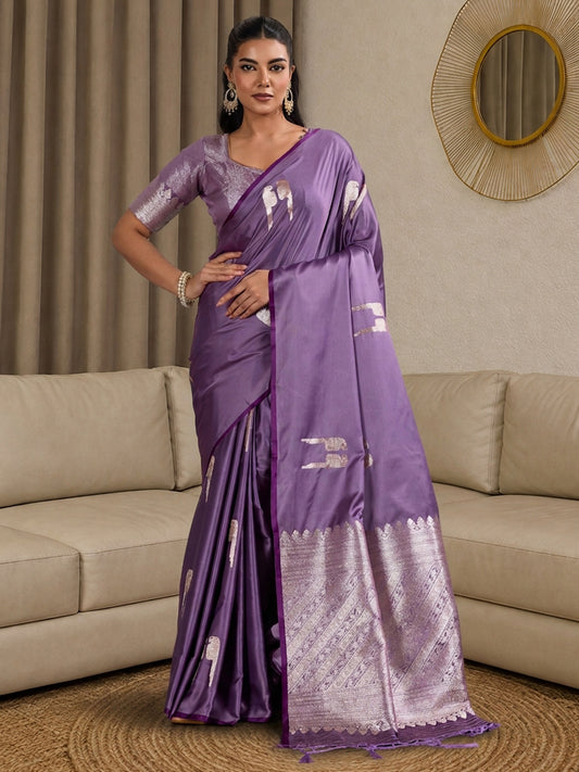 Woman wearing lavender satin saree with botanical floral and leaf design and lavender blouse