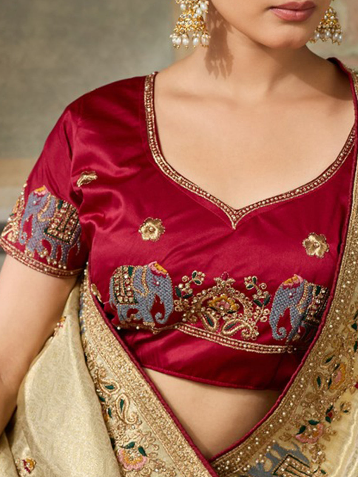 Unstitched maroon  blouse piece with embellished design