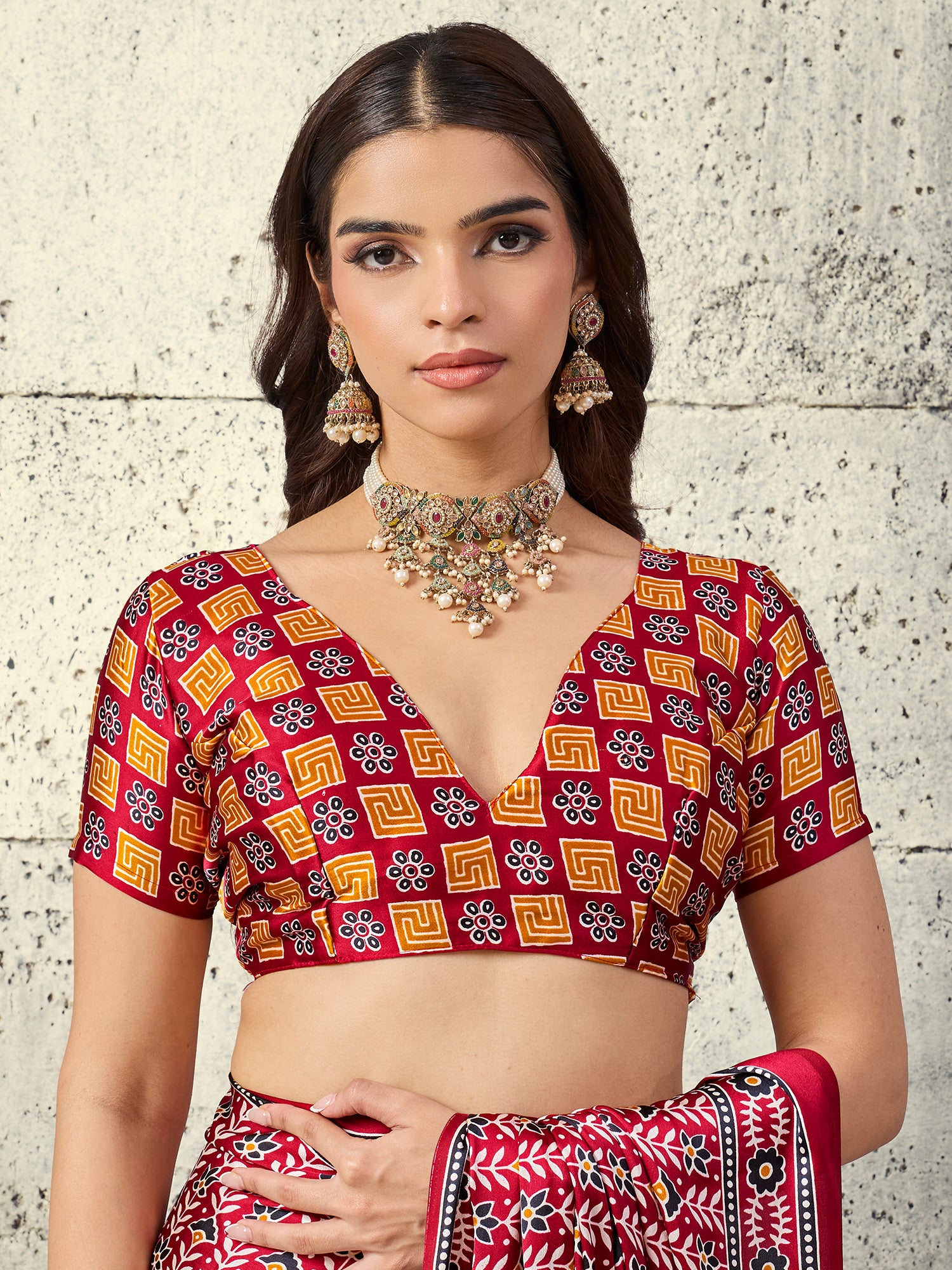 Unstitched rust satin blouse piece with ajrak design