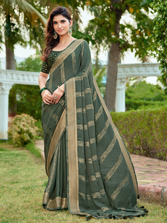 Woman wearing light green georgette saree with striped pattern design and light green blouse
