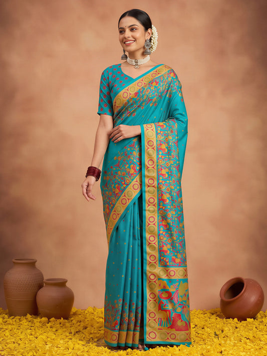 Woman wearing light blue silk blend saree with metallic foil print work and light blue blouse