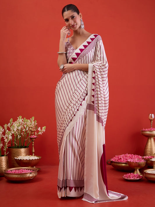Woman wearing white satin ready to wear saree with striped pattern design and white blouse