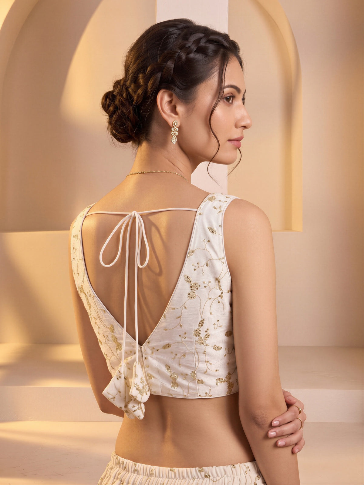 White sequin embroidered vichitra silk sleeveless readymade saree blouse with v neck view 1