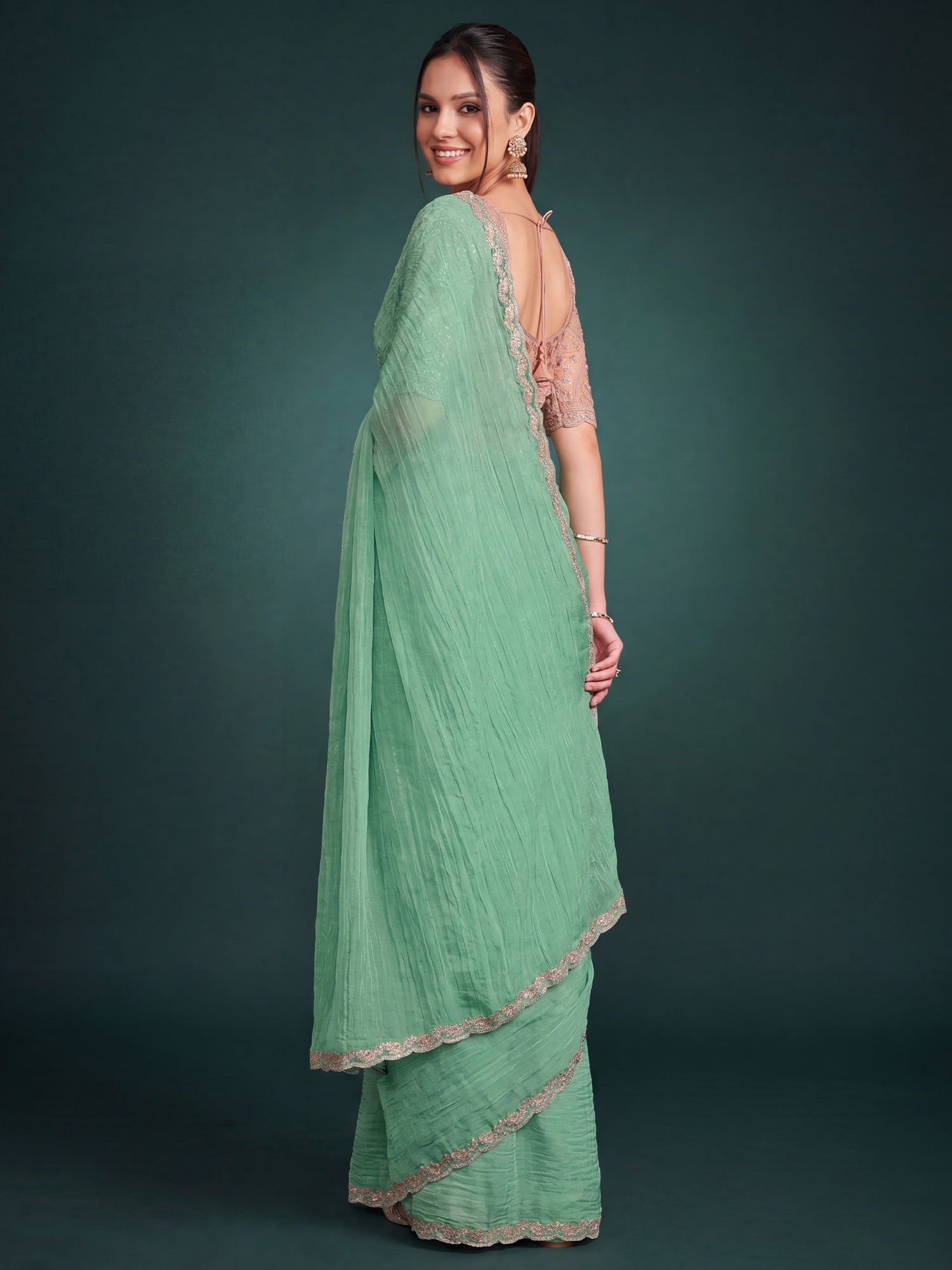 Turquoise Georgette saree – detail view 1