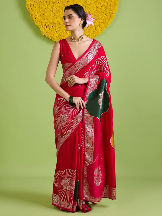 Woman wearing red silk blend saree with zari butta (metallic motif) work and red blouse