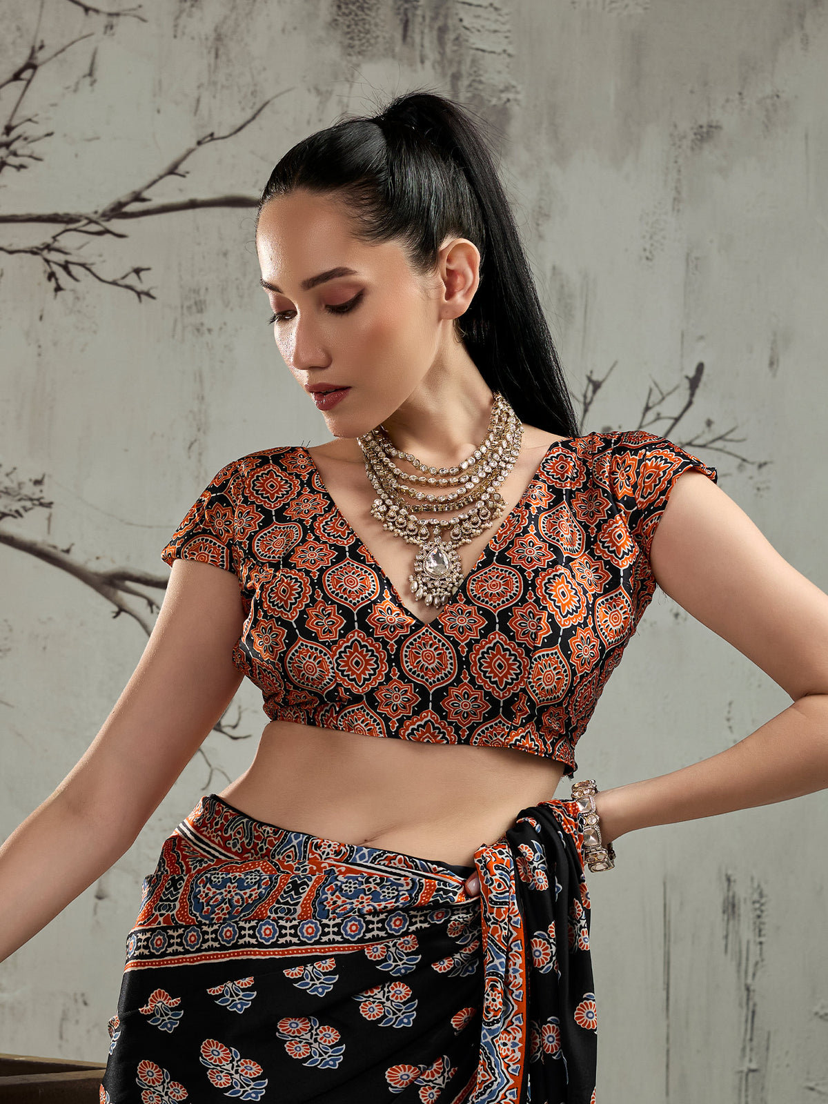 Unstitched rust satin blouse piece with ajrak design