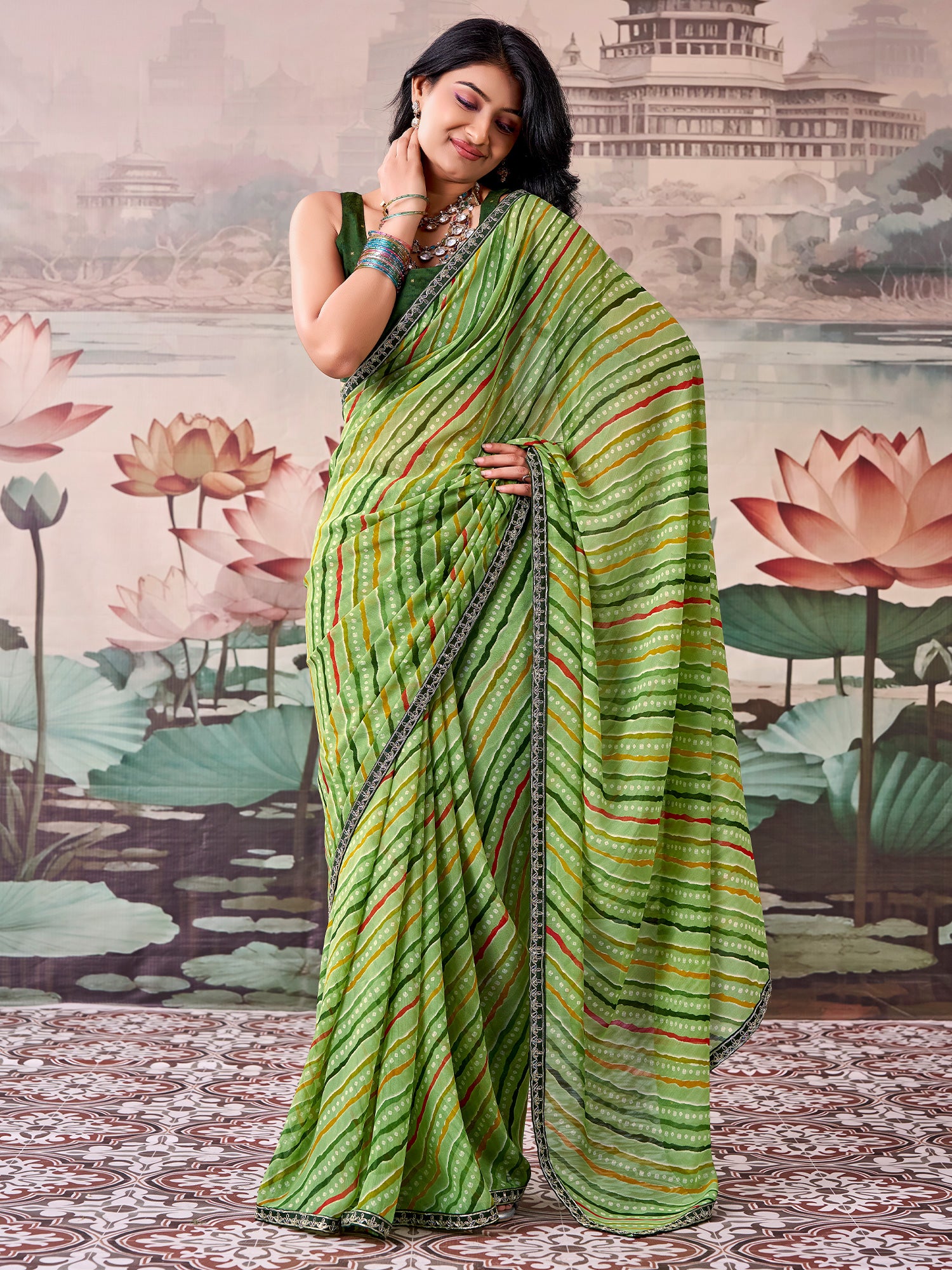 Woman wearing light green georgette saree with leheriya design and green blouse