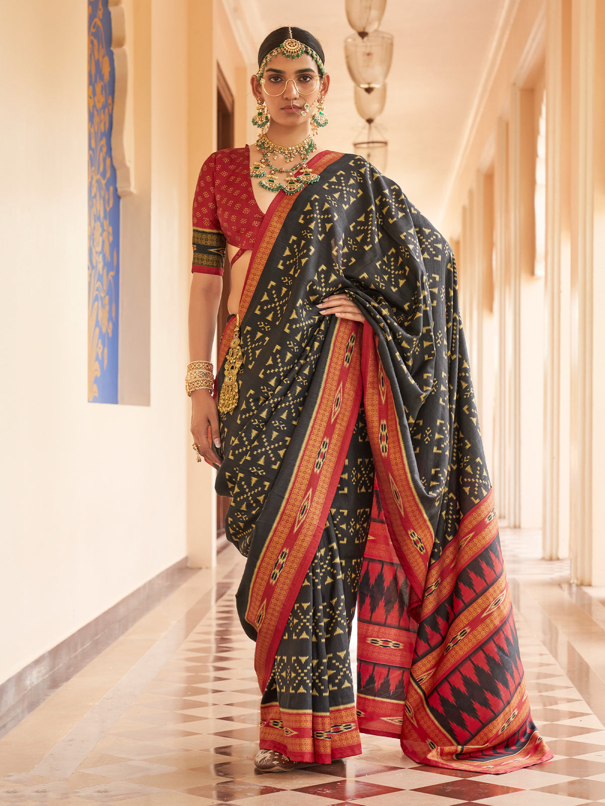 Black ikat silk blend saree with red blouse piece