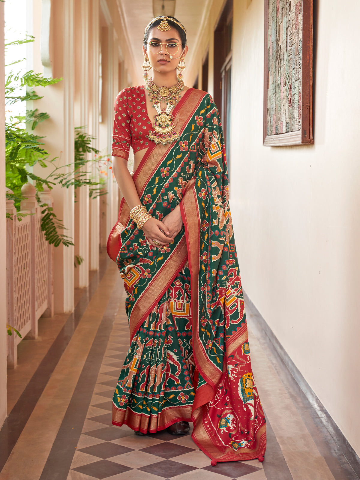 Green ikat silk blend saree with red blouse piece