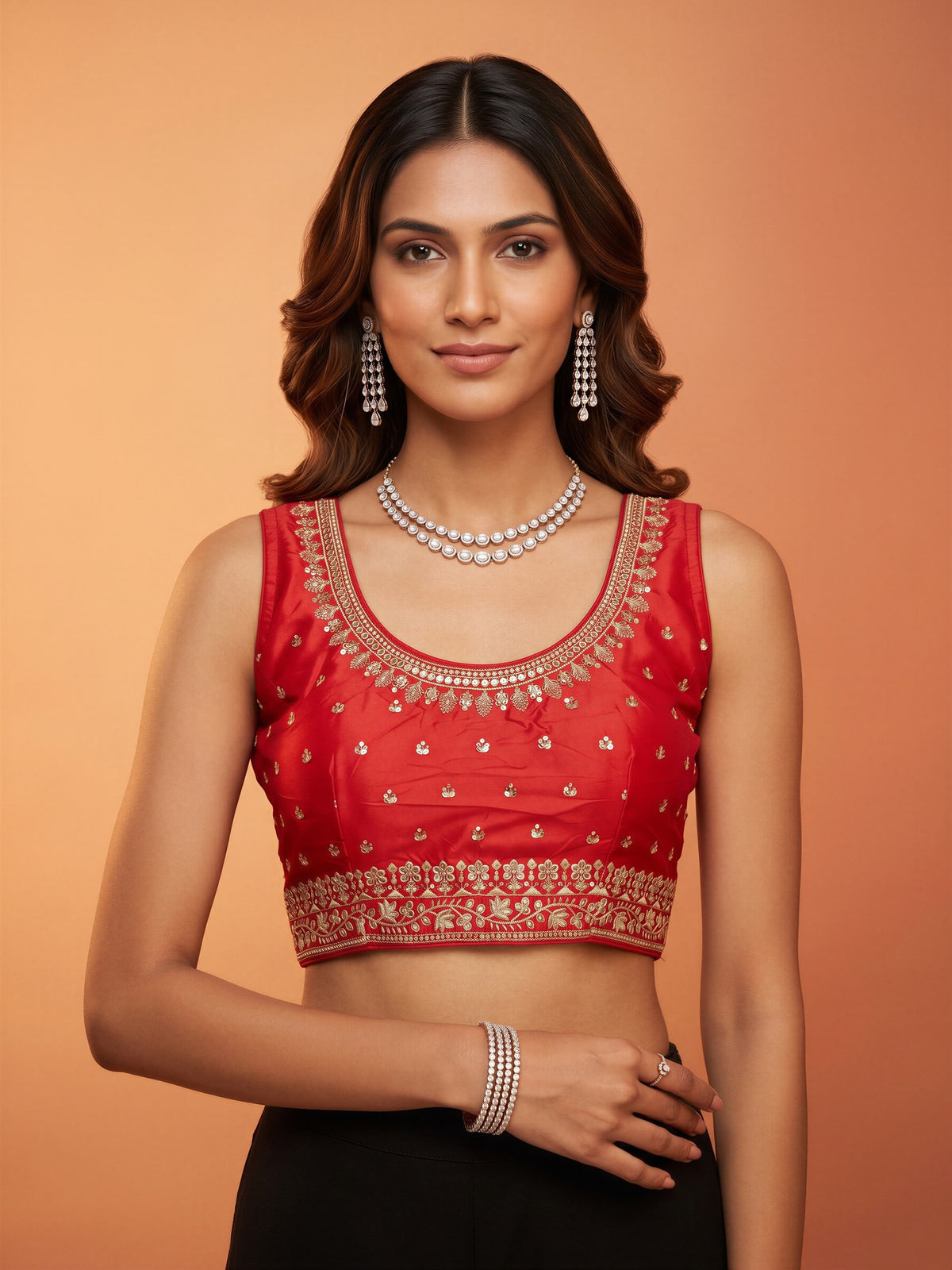 Red sequin embellished silk blend sleeveless readymade saree blouse with round neck