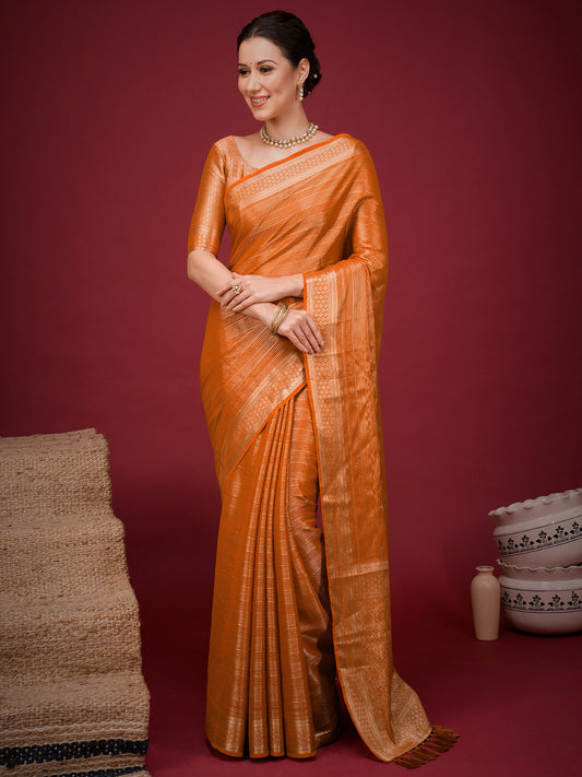 Woman wearing orange viscose silk saree with striped pattern design and orange blouse