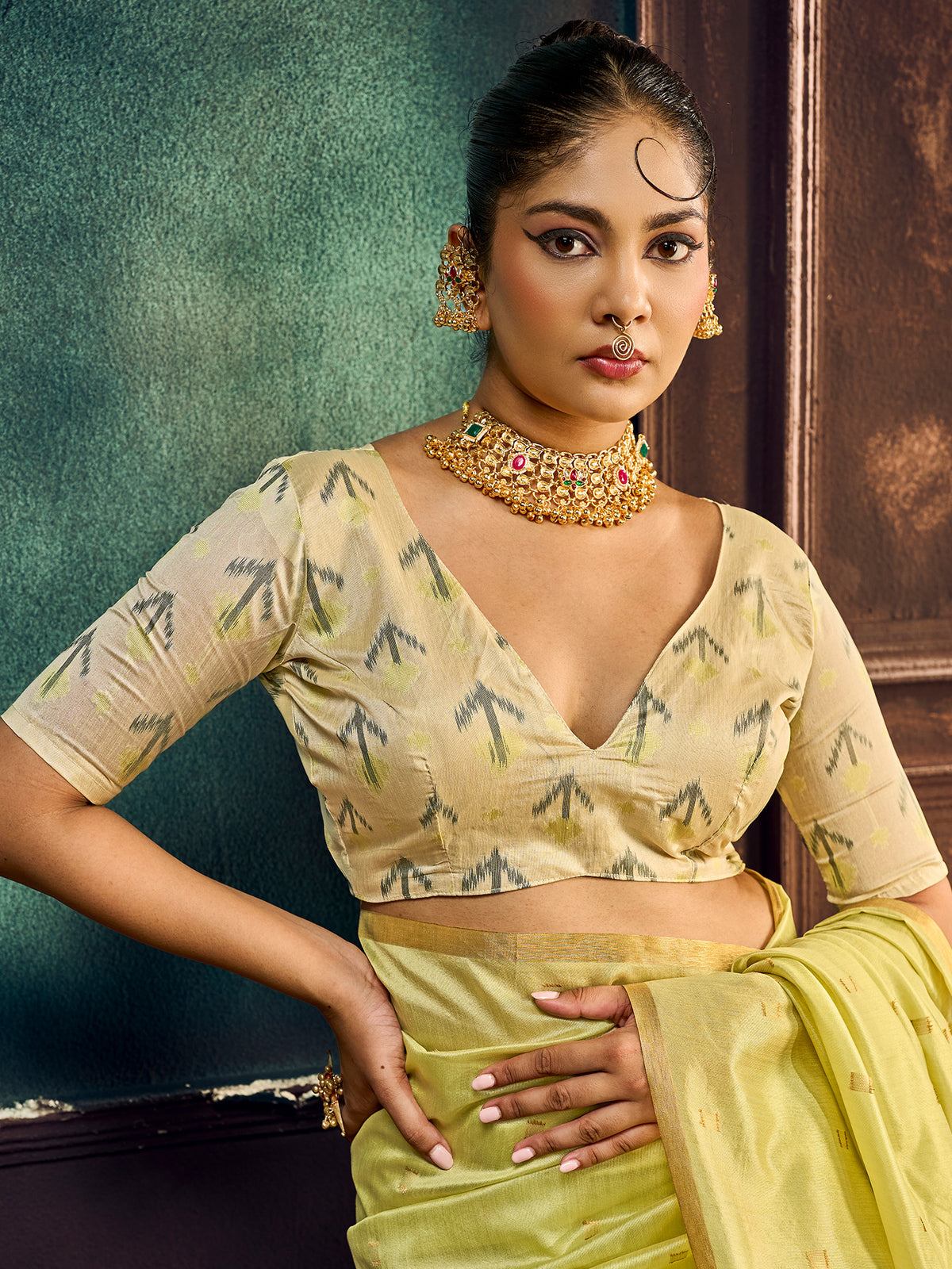 Unstitched light green cotton silk blouse piece with ethnic motif design