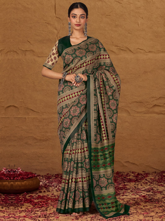 Woman wearing green silk blend saree with ajrak block-print motif work and green blouse