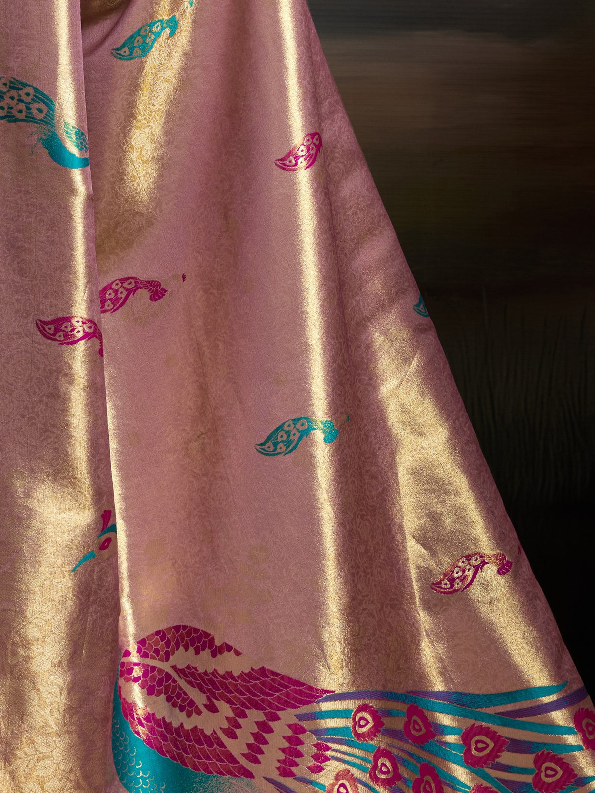 Pallu detail of pink banarasi silk saree showing woven motif design and zari border