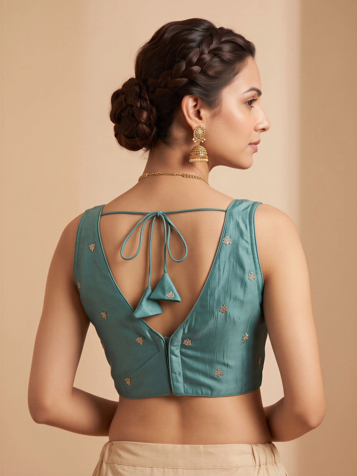 Turquoise Blue sequin embellished vichitra silk sleeveless readymade saree blouse with v neck view 1