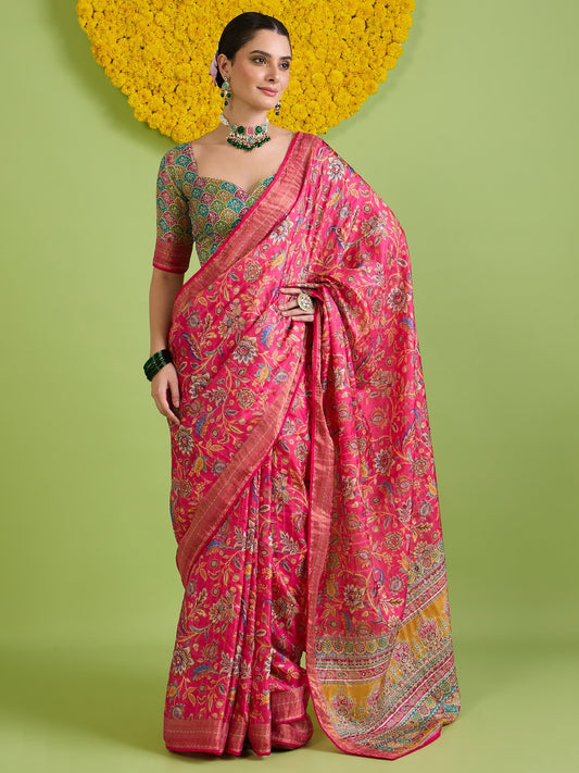 Woman wearing pink tussar silk saree with traditional indian motif work and multicolored blouse