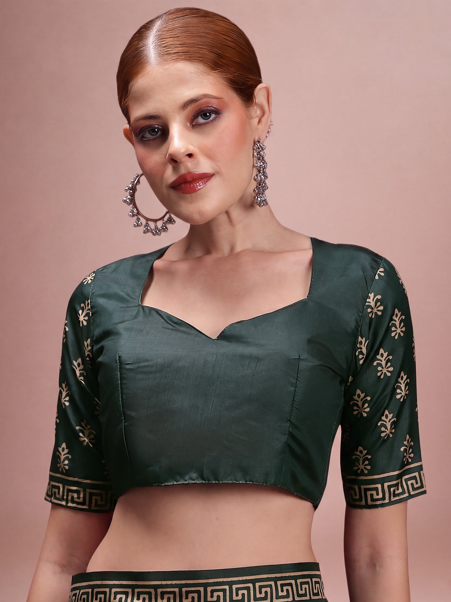 Unstitched dark green silk blend blouse piece with ethnic motif design