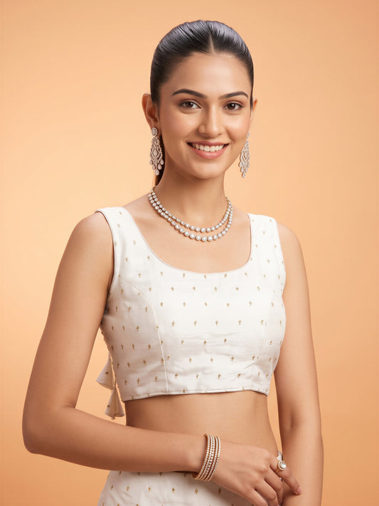 White sequin embellished silk blend sleeveless readymade saree blouse with round neck