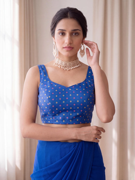 Turquoise Blue zari woven silk blend sleeveless readymade saree blouse with round neck