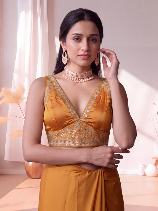 Orange sequin embellished silk blend sleeveless readymade saree blouse with deep v neck