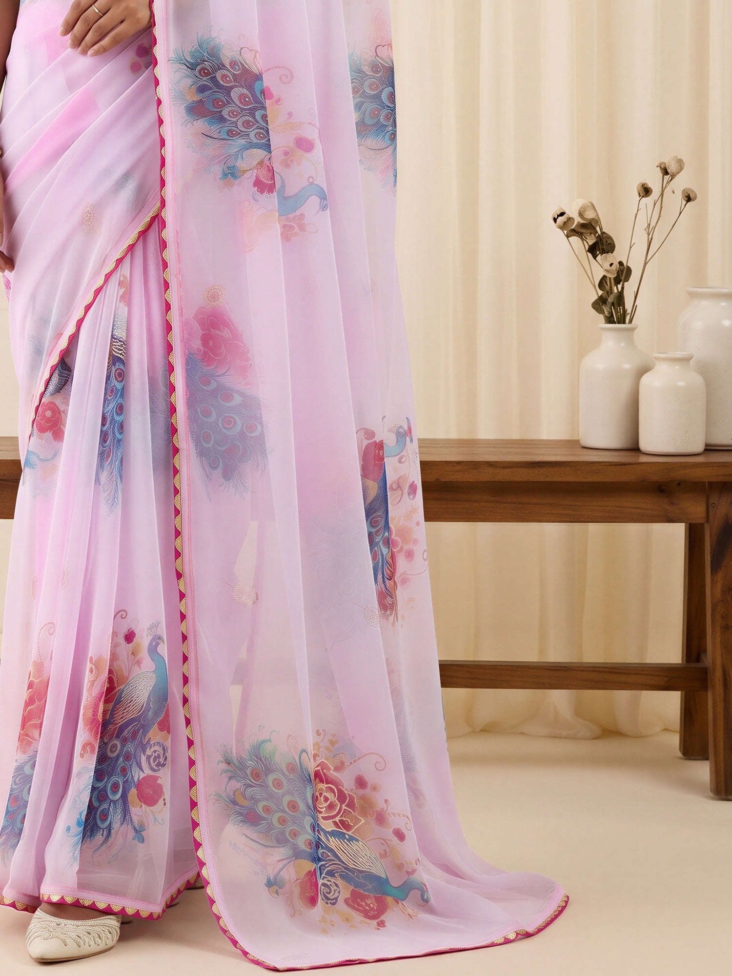 Pallu detail of lavender georgette saree showing metallic foil print work and printed border