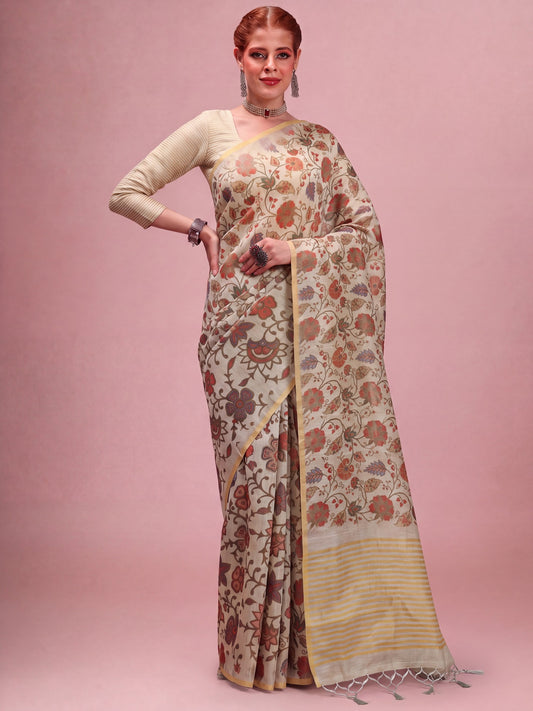 Woman wearing beige tissue saree with botanical floral and leaf design and beige blouse