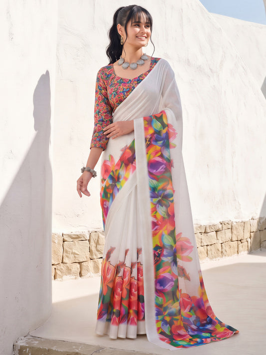 Woman wearing white cotton linen saree with all-over floral design and multicolored blouse