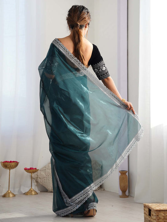 Teal Organza Saree with Silver Embroidered Border
