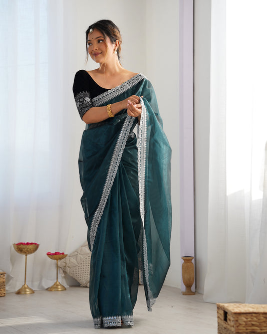 Teal Organza Saree with Silver Embroidered Border