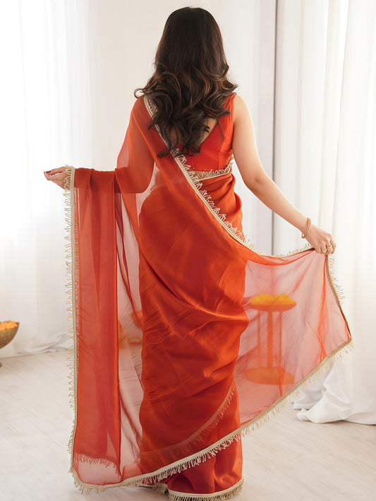 Rust Orange Organza Saree with Gold Fringe Border