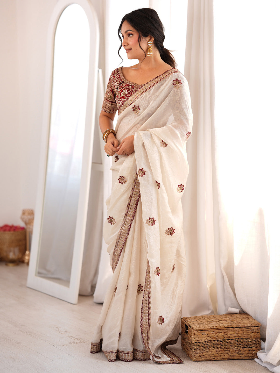 Ideal for festive and wedding occasions
Elegant ivory white color
Rich maroon embroidered blouse