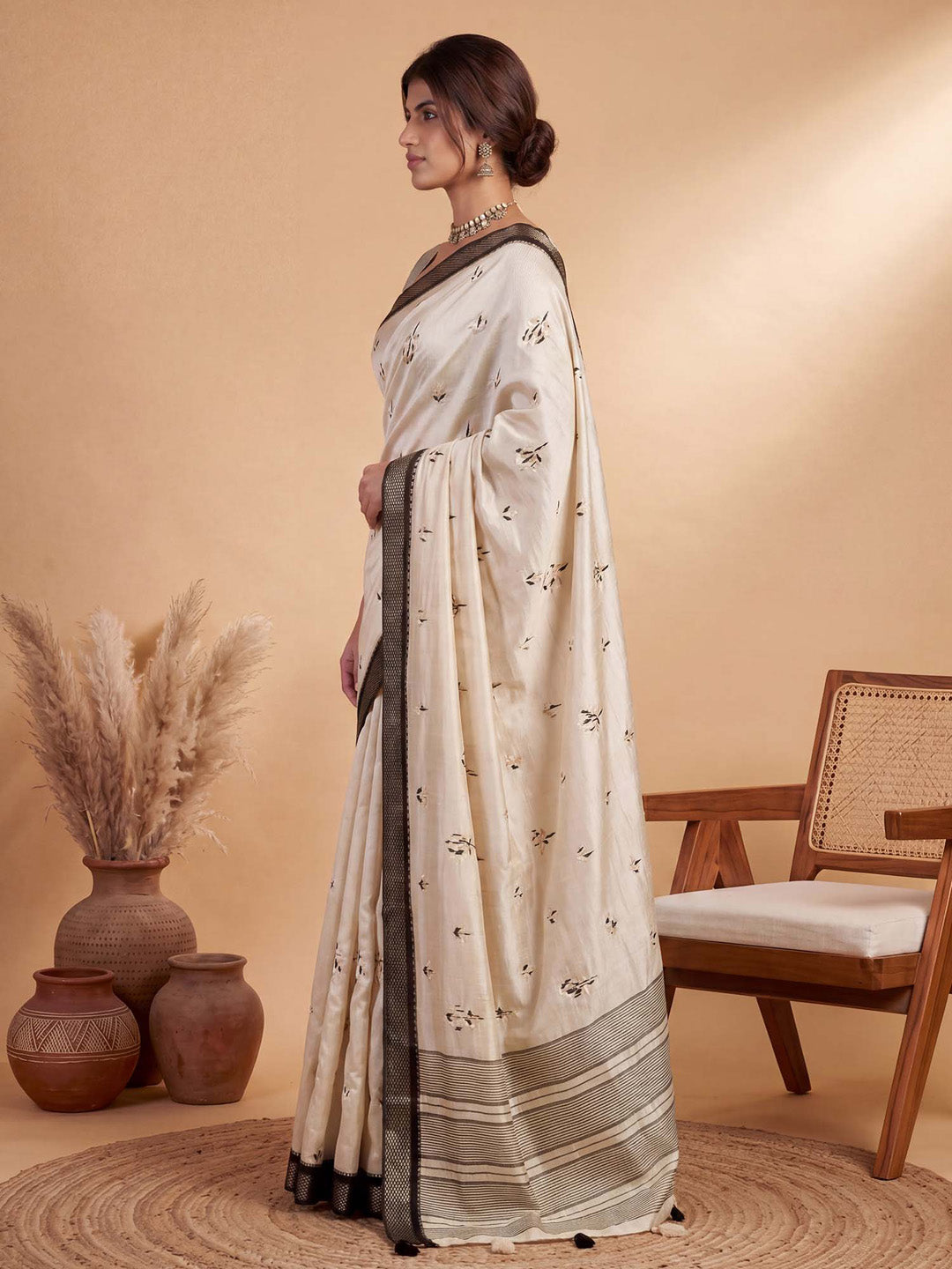casual saree
white collection saree
tassels saree collection